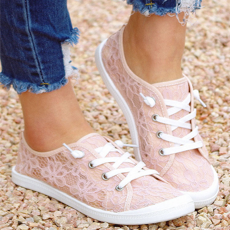 Lightweight lace slip-on flats on white background