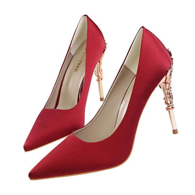 Shoes with shadow on neutral backdrop