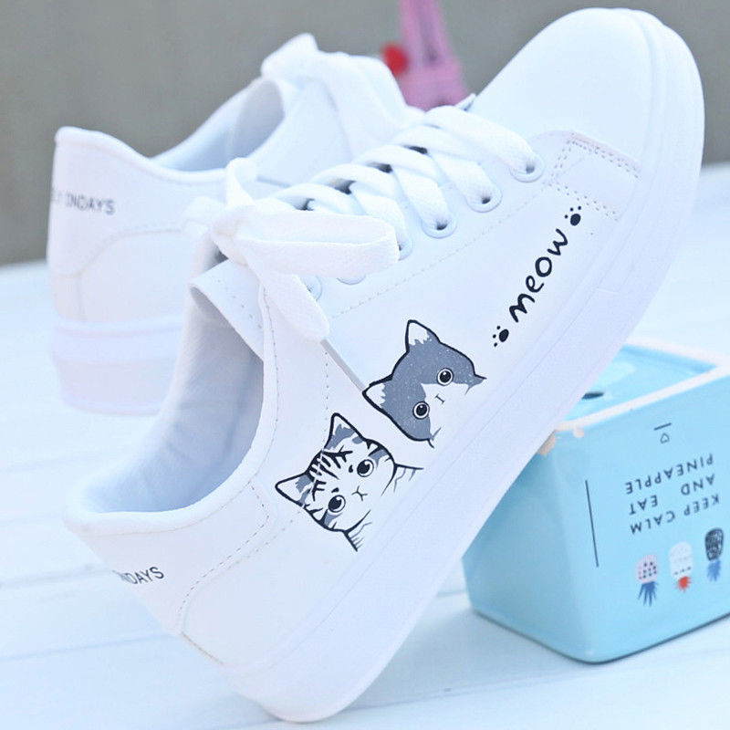 "Girls’ sneakers styled with jeans and a backpack"