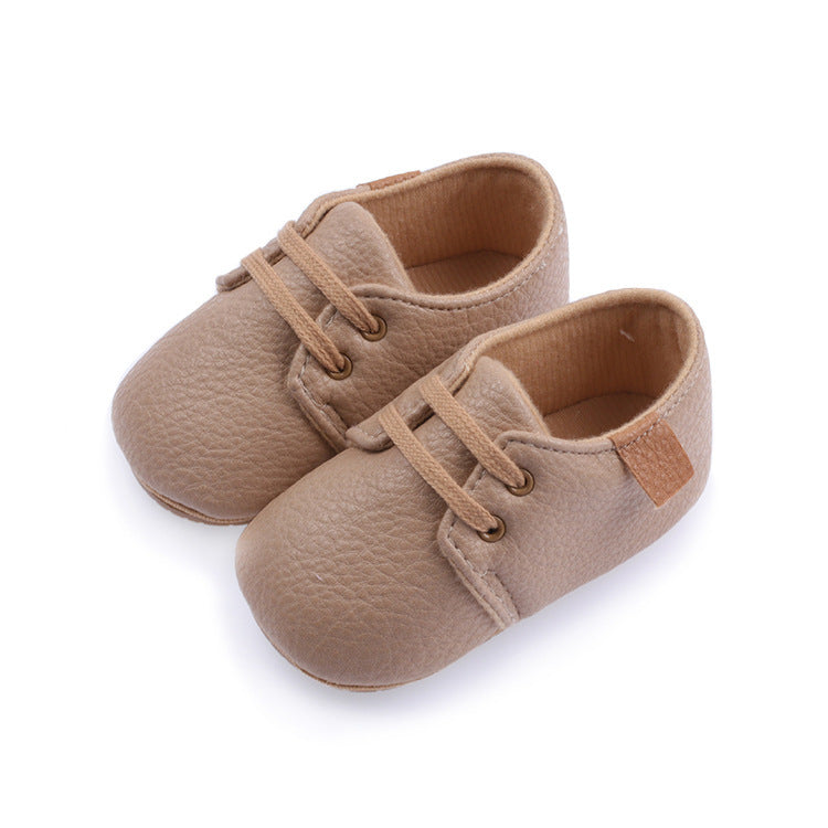 Side view of baby shoes with non-slip soles