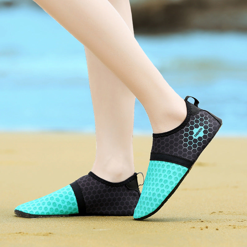 Couple wearing matching unisex water shoes