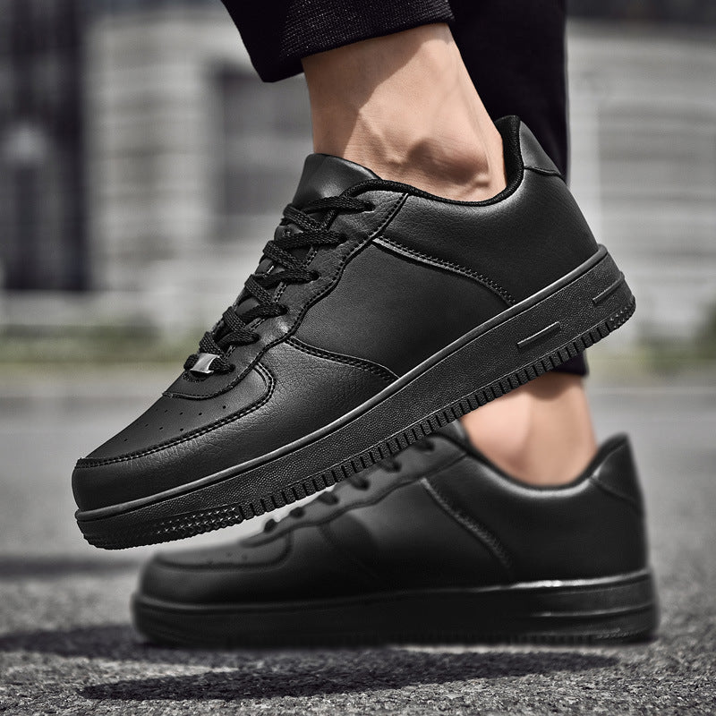 "Side view of white leather sneakers on clean background"