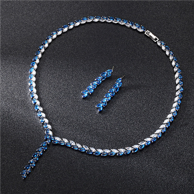 Crystal bridal jewelry on white fabric


