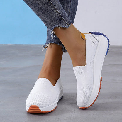 Model jogging wearing black sport shoes


