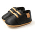 Close-up of soft sole baby sneakers with breathable fabric

