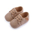 Side view of baby shoes with non-slip soles

