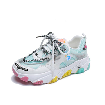 &quot;Air mesh shoes on pavement with shadow&quot;

